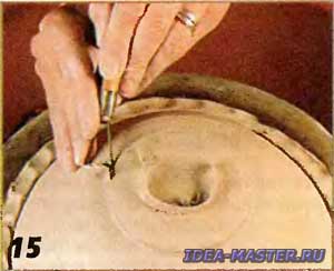 Cut the clay from the base of the bowl
